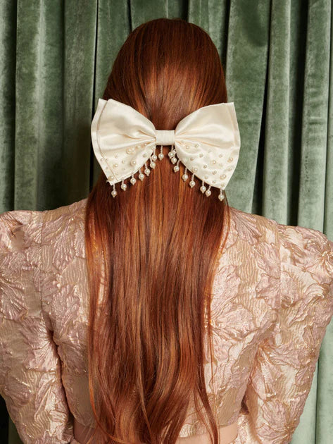 Spectacle pearl hair bow