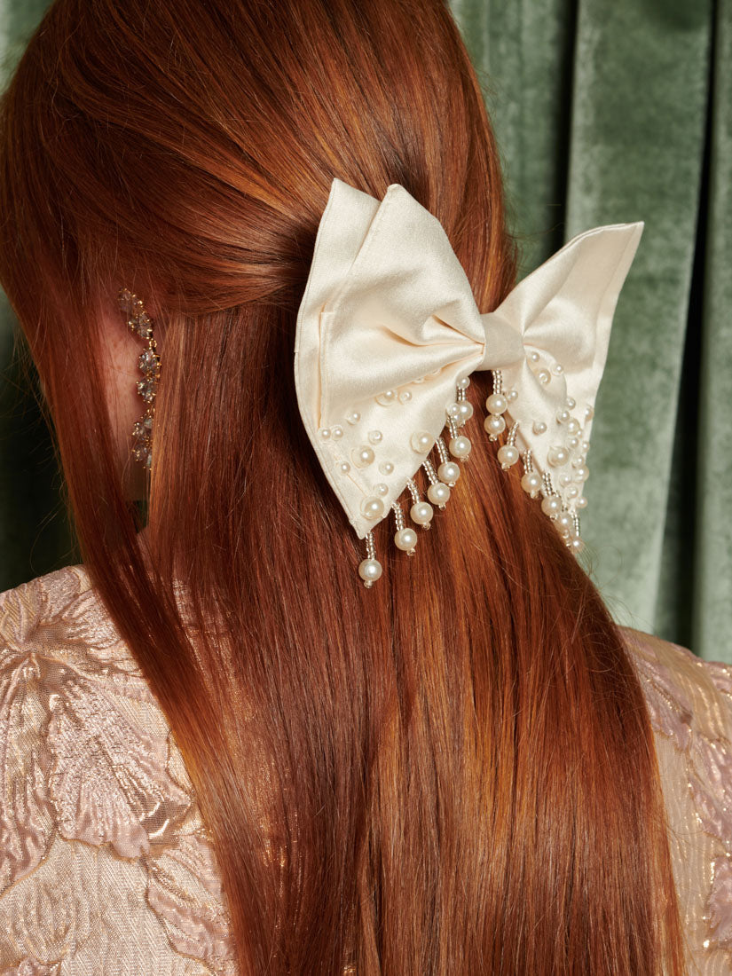 Spectacle pearl hair bow